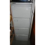 A 4 drawer filing cabinet with key