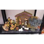 An unusual pottery 'Nativity' stable and figurines