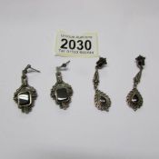 2 pairs of art nouveau style pendant earrings including silver pair marked 925.