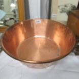 A copper 2 handled jam pan.