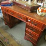 A mahogany double pedestal desk.