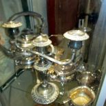 A mixed lot of silver plate including kettle on stand, tea set, candlesticks etc.