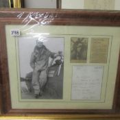 A signed letter by Douglas Bader in a framed collage with pictures etc.