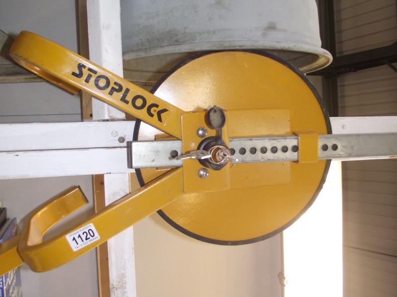 A stoplock anti-theft wheel clamp with key