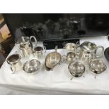 A selection of silver plated tea ware & a sauce boat,