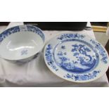 A Chinese blue and white willow pattern plate and a blue and white a/f bowl.