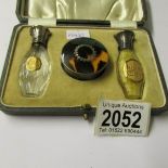 A cased silver and tortoise shell ladies perfume set, "M H & Co.," 1923.