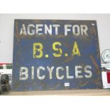 A painted board advertising sign for BSA bicycles
