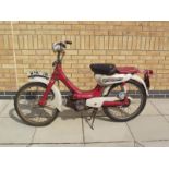 A 1975 Honda 50cc moped,