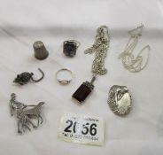 A mixed lot of silver jewellery including mouse brooch, pendant set red stone, 2 rings,