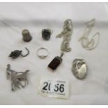 A mixed lot of silver jewellery including mouse brooch, pendant set red stone, 2 rings,