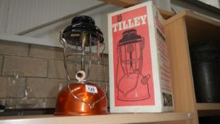 A boxed Tilley lamp