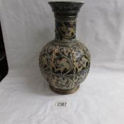 An 1876 Doulton Lambeth vase with marks for Frank Butler (restored)