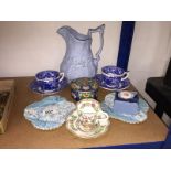 A mixed lot of china including cups, saucers, lidded pots etc.