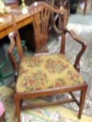 An oak carver chair.