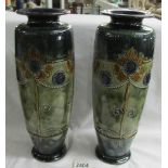 A pair of early Doulton vases bearing marks for E Violet Hayward.
