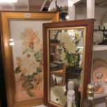 A floral picture and a hand painted floral mirror.