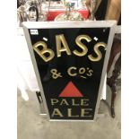 An architectural Bass sign on a 36" x 18" x 1" thick slate