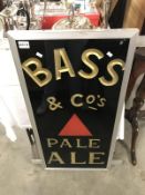 An architectural Bass sign on a 36" x 18" x 1" thick slate