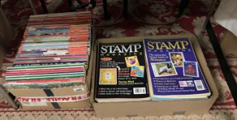 2 boxes of stamp magazines