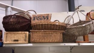 11 wicker baskets including a small fortnam and mason liamper basket, 3 hanging baskets,