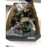 A box of assorted costume jewellery