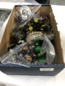 A box of assorted costume jewellery