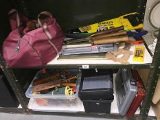A shelf of woodworking hand tools, some new in box including chisels, saws & drill bits etc.
