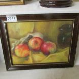 An oil on board still life of apples signed O Moore.