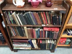 A dark wood 4 shelf bookcase