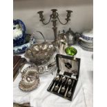 A quantity of silver plated items including cake stand, candelabra etc.