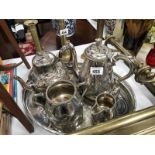 A silver plate tea set on tray