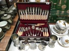 A boxed case of cutlery etc.