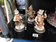 3 period folk costumed boy figurines each playing pretend instruments