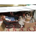 A quantity of porcelain collectors dolls & a pram