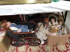 A quantity of porcelain collectors dolls & a pram