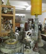 A collection of Cornish Serpentine including lighthouse lamp, lighthouse cigarette lighter,