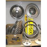 A quantity of wheel trims and used number plates