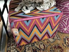 An Amy Kent pouffe (square zig zag multicolour)