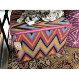 An Amy Kent pouffe (square zig zag multicolour)