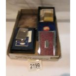 A Halcyon days enamel patch box, a card case, a cigarette case etc.