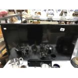 A Samsung 32" flat screen TV