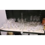 A quantity of drinking glasses including crystal.