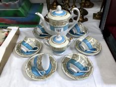 A Tokyo china coffee set with blue and white gold edges