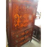 A modified marquetry inlaid secretaire cabinet.