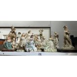 A biscuit porcelain lady and children's figurines.