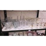 A shelf of good quality drinking glasses including punchbowl with 12 cups (only 8 hooks)