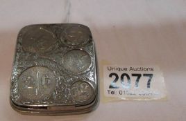 A white metal pre-decimal coin case.