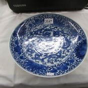 A 19th century Chinese plate with 6 symbol signature.