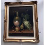 A gilt framed still life study of fruit